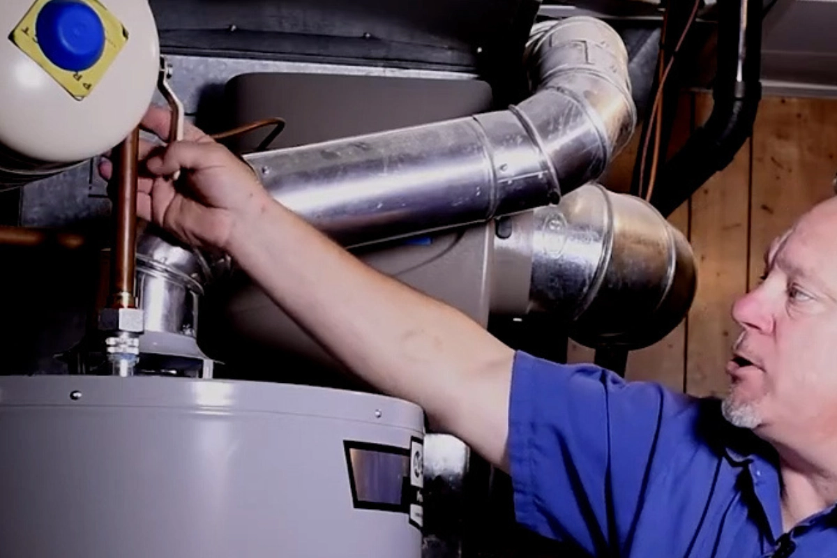 John A plumber, inspection a water heater